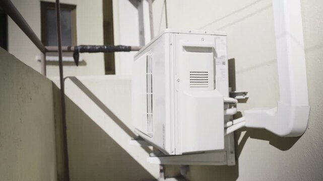 Outdoor Air Conditioning Unit with Safety Warning Signs