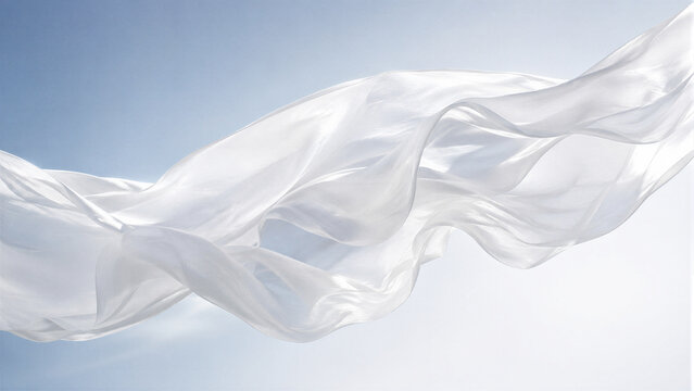 White sheer fabric gracefully flowing and draped with soft folds and translucent texture