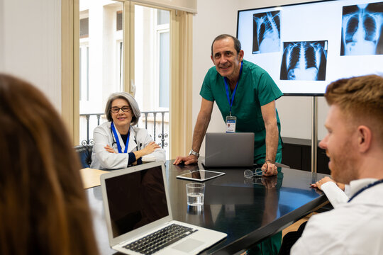 Healthcare professionals holding a meeting to discuss patient diagnostics