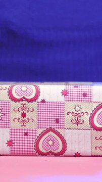 Gift wrapping present with decorative paper