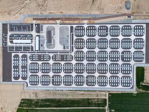 drone aerial view of large solar power station in desert