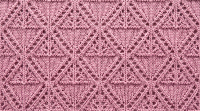 Delicate pink knit lace pattern with diamond shapes during a soft studio lighting for textile design backgrounds