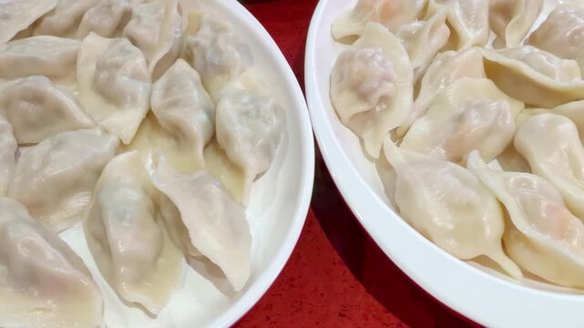 Dim Sum Plates on Chinese Restaurant Table &ndash; Traditional Steamed Snacks