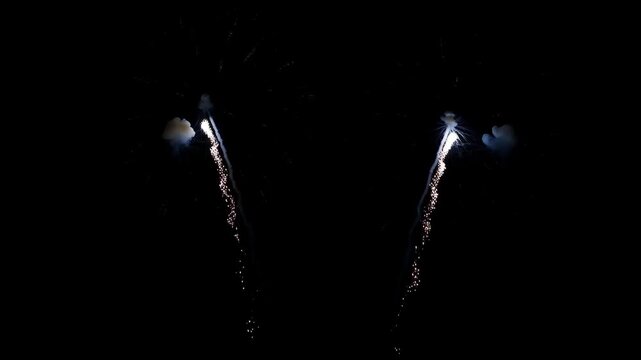 Firework Burst Illuminating Night Sky with Sparkling Trail, Celebration Festival Pyrotechnic Display