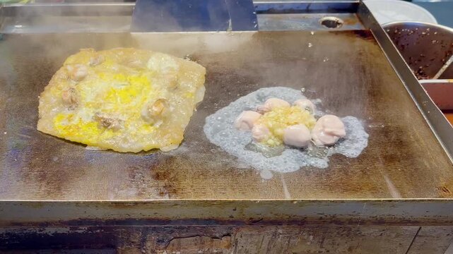 Korean Seafood Pancake &ndash; Oysters and Egg on Hot Plate Street Food