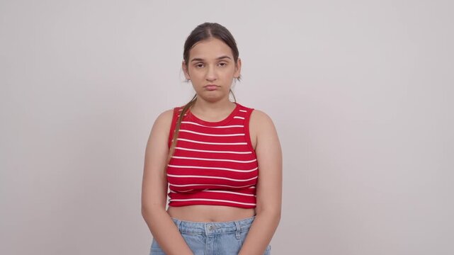 Indian Teenage Girl Feeling Guilty and Looking Down