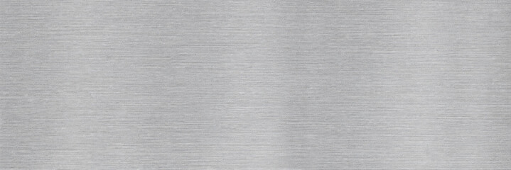 Brushed stainless steel texture, metallic silver background. Sleek brushed aluminum finish pattern, smooth shiny surface mockup for industrial design and technology backgrounds.