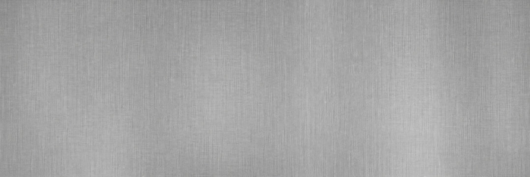 Brushed silver metal texture, panoramic stainless steel background, industrial aluminum surface with fine vertical grain