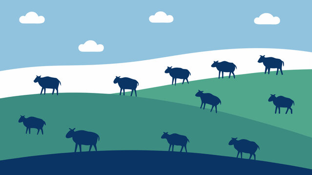 Silhouettes of sheep grazing on green and blue rolling hills under white clouds and blue sky.