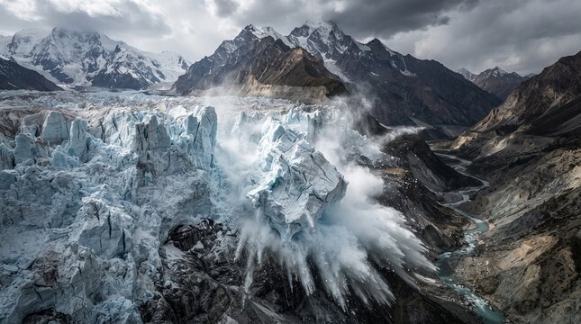A massive glacier section breaks away from a towering ice wall, sending falling ice and snow mist into the valley beneath dramatic mountain peaks and storm clouds.