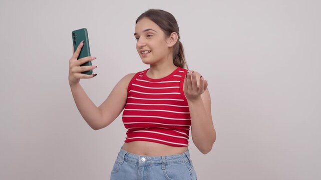 Indian Teenage Girl Talking on Video Call