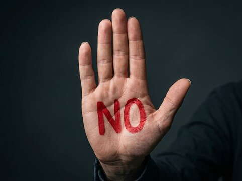 Open Palm with NO Message Representing Refusal and Personal Boundaries. Refusal, rejection, personal boundaries, consent, and assertive communication. Protection, prevention, disagreement, independent