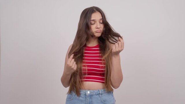 Indian Teenage Girl Checking Dry and Damaged Hair Split Ends