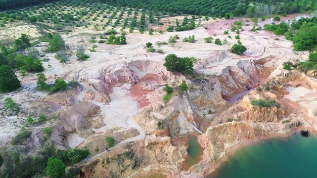 Bangka island industrial landscape showing ex tin mining pits converted into palm oil agricultural land