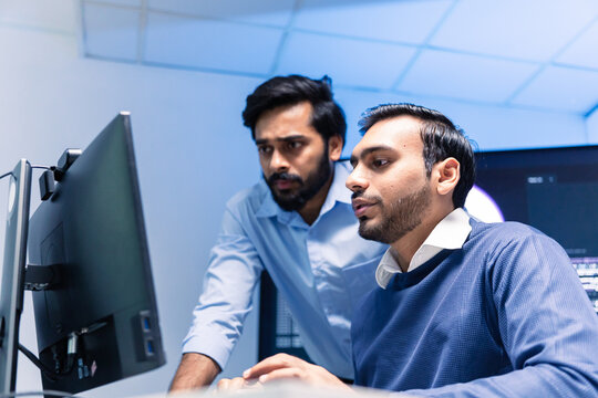 Team engineers software developers are brainstorming and using computer writing code to develop AI technology. Programmer using laptop work system about artificial intelligence and cyber security