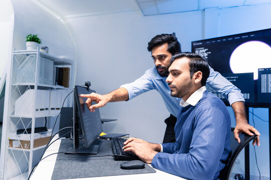 Team engineers software developers are brainstorming and using computer writing code to develop AI technology. Programmer using laptop work system about artificial intelligence and cyber security