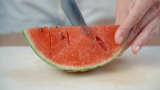 Cutting Watermelon Flesh into Pieces with Kitchen Knife