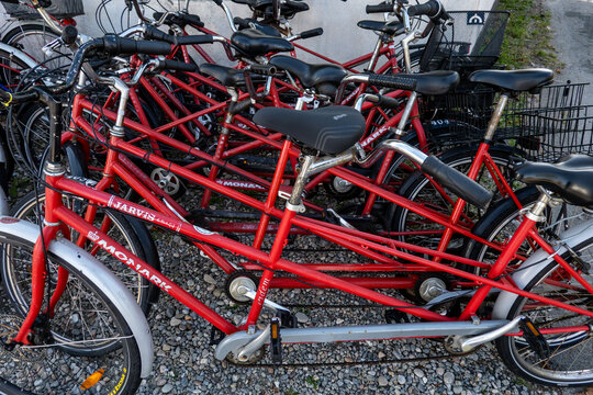 Vesteroe Havn, Laesoe, Denmark  A collection of tandem bicycles for rent at a bicycle store.