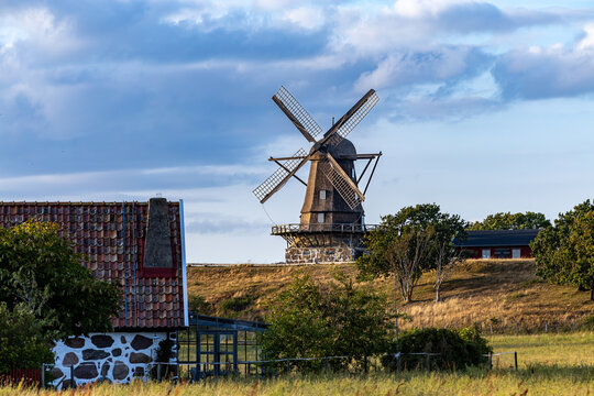 Hoganas, Sweden  An old-fashioned windmill over an agricultural landscape.