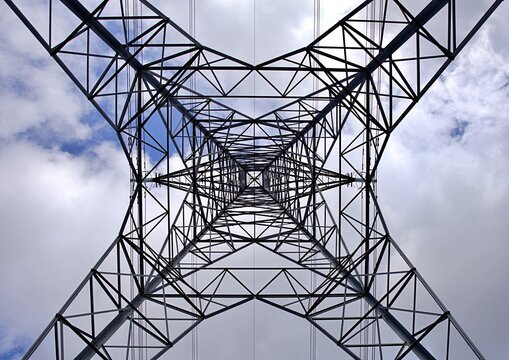 Looking up through an electricity pylon