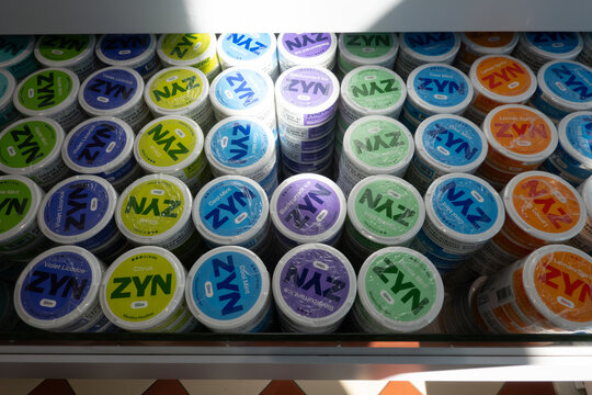 Stockholm, Sweden Aug 24, 2026  Tins of Zyn nicotine pouches in a retail store.