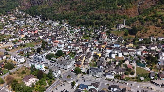 A panoramic aerial view beside the old town of the city Biasca in Switzerland on a sunny summer noon.
