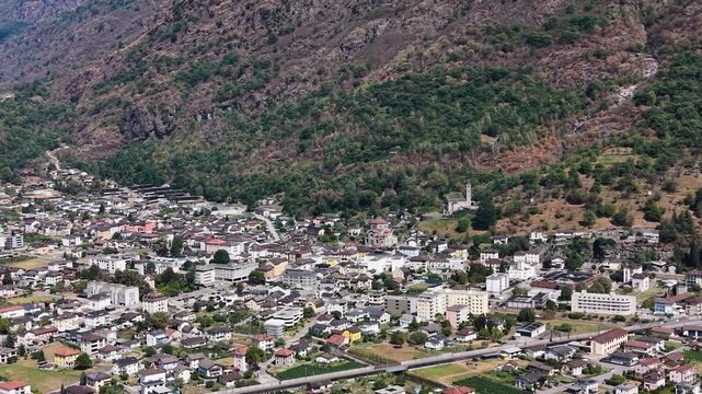A panoramic aerial view beside the old town of the city Biasca in Switzerland on a sunny summer noon.