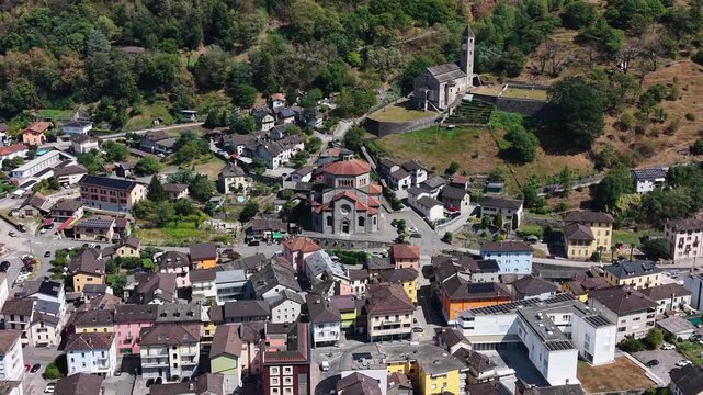 A panoramic aerial view beside the old town of the city Biasca in Switzerland on a sunny summer noon.