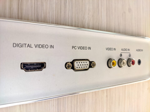 Closeup of an audiovisual connection panel featuring VGA, video, and audio input ports, installed on a modern wall, representing multimedia connectivity for entertainment and presentation systems.