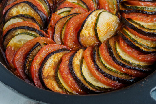Colorful baked vegetable ratatouille in a casserole dish