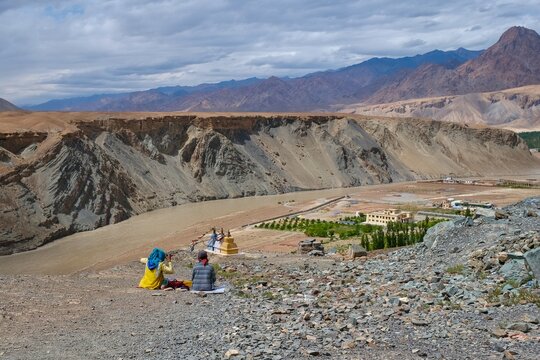 Local women road workers rest in Nimmu Valley near Sangam, confluence of Indus and Zanskar rivers in Ladakh, India,Himalayas 