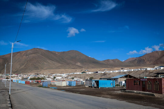 Streets of Murghob village by summer morning, Pamir Highway, Tajikistan