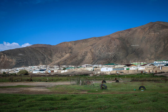 Streets of Murghob village by summer morning, Pamir Highway, Tajikistan