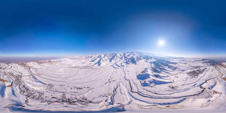 Panoramic 360 View of Snow-Covered Mountains and Village in Kyrgyzstan