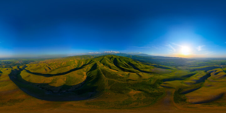 Panoramic View of Rolling Green Hills in Kyrgyzstan