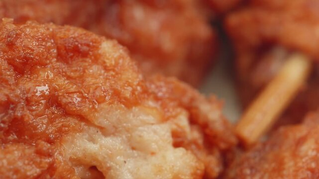 Chicken satay marinade skewer macro close up presentation slowly rotating stock footage