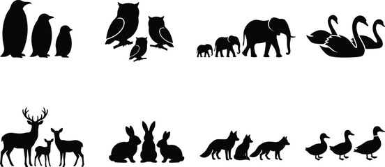 Set of wild animal family silhouettes featuring penguins, owls, elephants, swans, deer, rabbits, foxes, and ducks isolated on clean white background © Tanne