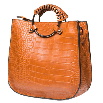 Tan brown leather womens handbag with crocodile pattern isolated on white background. Classic tote bag side view