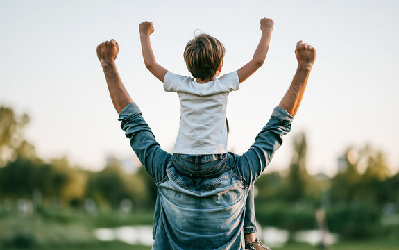 Dad and son outdoors. Happy family