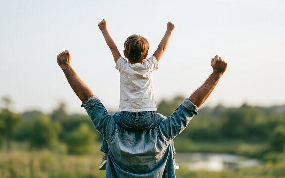 Dad and son outdoors. Happy family