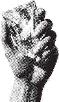 Hand holding rough crystal with halftone pattern in dramatic lighting for luxury concepts