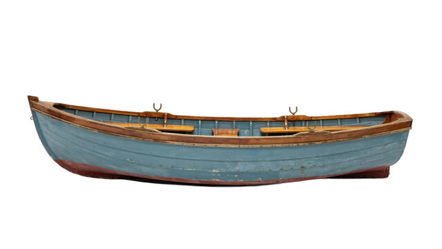Side view of a small blue wooden rowboat with brown trim and metal oarlocks on a white background, isolated on a, transparent background