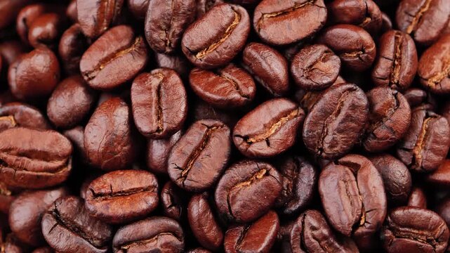 Roasted Coffee Beans Spinning in a Bowl