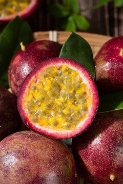 fresh ripe passion fruits on wooden table
