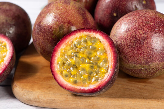 fresh ripe passion fruits on wooden table