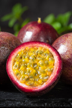 fresh ripe passion fruits on wooden table