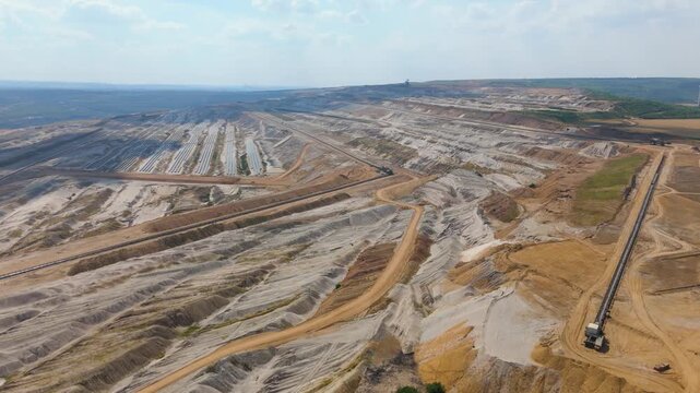 Hambach open pit mine operation area, mining lignite with solar panel photovoltaic modules, change to renewable sustainable energy