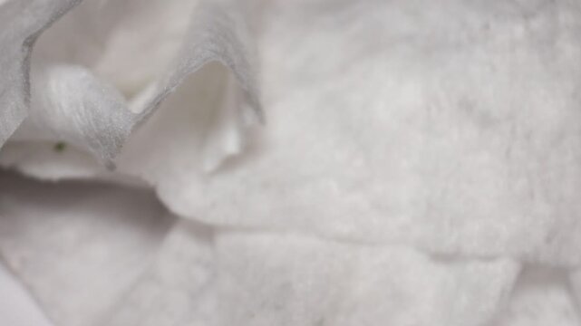 A close-up of a piece of paper on a bed, suitable for use in a study or office setting. Rotating in a circle