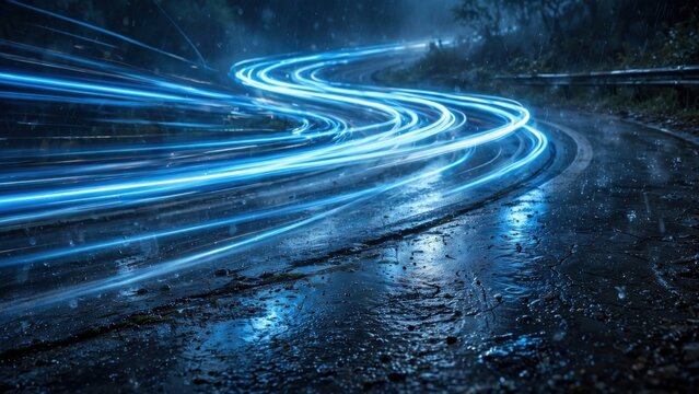 Streaking blue lights blur a winding, wet road at night, suggesting speed and motion