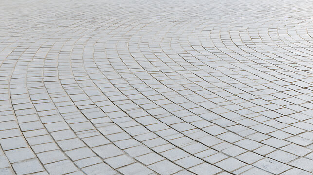 Curved pattern of light gray cobblestone pavement texture background abstract design for urban architecture floor tile surface background